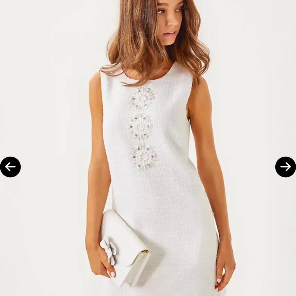 Chic White Sleeveless Dress with Floral Embellishments